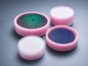 Silicon wafers protected in pink foam-lined wafer jars for semiconductor handling and transport
